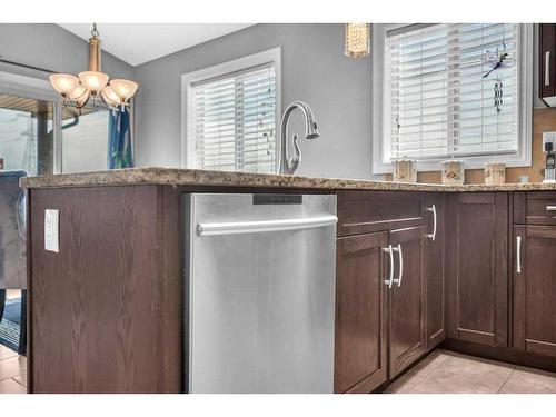 100 Rainbow Falls Row, Chestermere, AB - Indoor Photo Showing Kitchen With Upgraded Kitchen