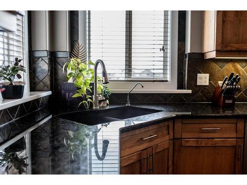 1518 High Park Drive Nw, High River, AB - Indoor Photo Showing Kitchen With Double Sink