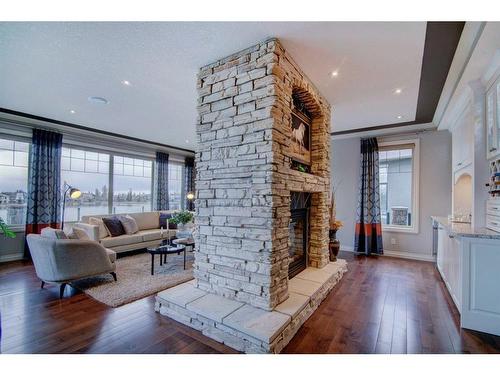 169 Chapala Point Se, Calgary, AB - Indoor Photo Showing Living Room With Fireplace