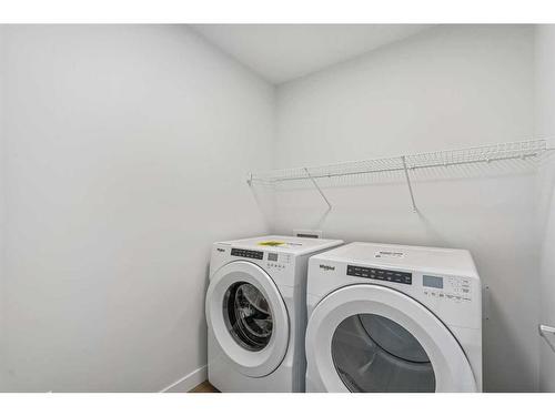50 Legacy Reach Park Se, Calgary, AB - Indoor Photo Showing Laundry Room