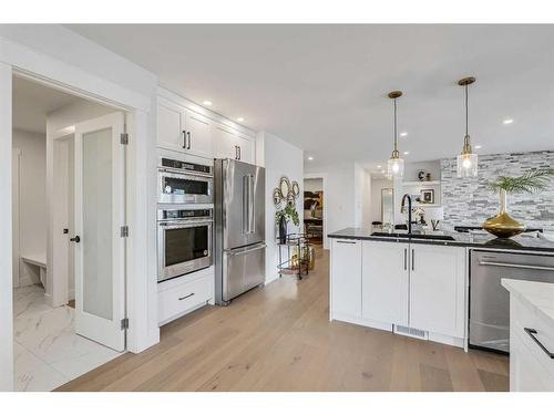 1327 Mapleglade Crescent Se, Calgary, AB - Indoor Photo Showing Kitchen With Upgraded Kitchen