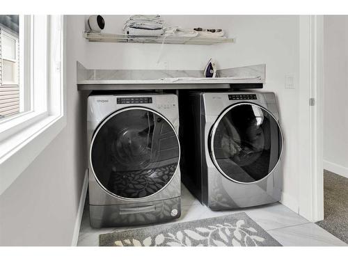 340 Lucas Way Nw, Calgary, AB - Indoor Photo Showing Laundry Room