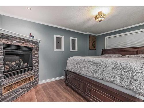 52 Riverbirch Road Se, Calgary, AB - Indoor With Fireplace