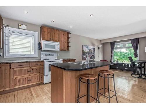52 Riverbirch Road Se, Calgary, AB - Indoor Photo Showing Kitchen With Double Sink