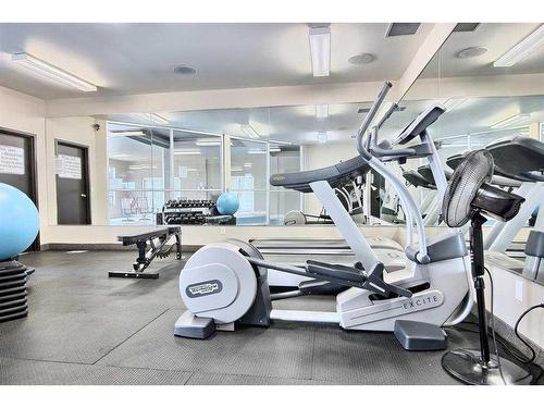 4-101 Village Heights Sw, Calgary, AB - Indoor Photo Showing Gym Room