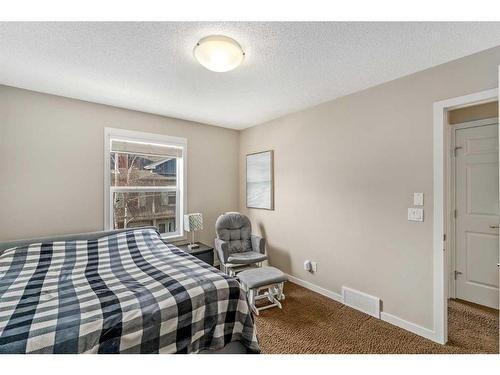319-10 Auburn Bay Avenue Se, Calgary, AB - Indoor Photo Showing Bedroom