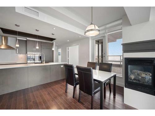 803-10 Shawnee Hill Sw, Calgary, AB - Indoor With Fireplace