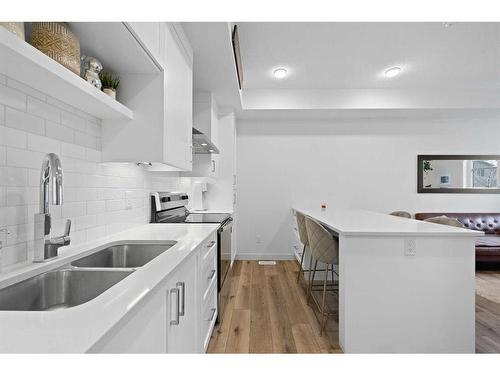 54 Walgrove Plaza Se, Calgary, AB - Indoor Photo Showing Kitchen With Double Sink With Upgraded Kitchen