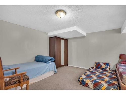 100 Martindale Crescent Ne, Calgary, AB - Indoor Photo Showing Bedroom