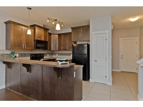 416 Ranch Ridge Meadow, Strathmore, AB - Indoor Photo Showing Kitchen