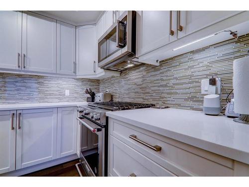 64 Cranbrook Drive Se, Calgary, AB - Indoor Photo Showing Kitchen With Upgraded Kitchen