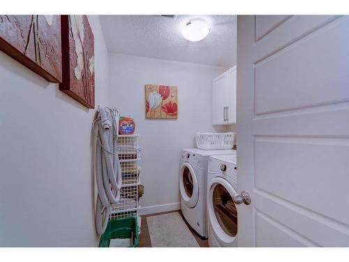 64 Cranbrook Drive Se, Calgary, AB - Indoor Photo Showing Laundry Room