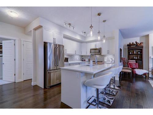 64 Cranbrook Drive Se, Calgary, AB - Indoor Photo Showing Kitchen With Stainless Steel Kitchen With Upgraded Kitchen