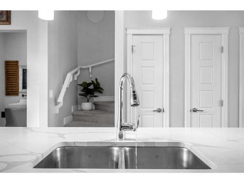 107 Savanna Boulevard Ne, Calgary, AB - Indoor Photo Showing Kitchen With Double Sink