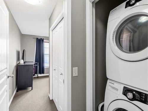 127 New Brighton Villas Se, Calgary, AB - Indoor Photo Showing Laundry Room