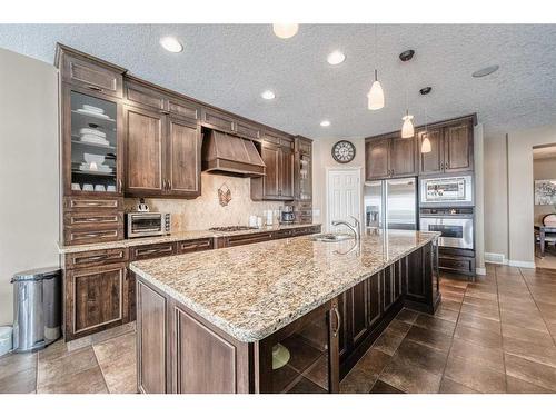 20 Panatella Manor Nw, Calgary, AB - Indoor Photo Showing Kitchen With Upgraded Kitchen