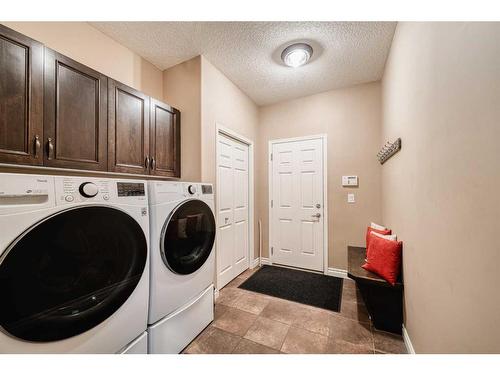 20 Panatella Manor Nw, Calgary, AB - Indoor Photo Showing Laundry Room