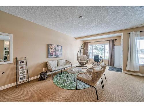 20 Panatella Manor Nw, Calgary, AB - Indoor Photo Showing Living Room