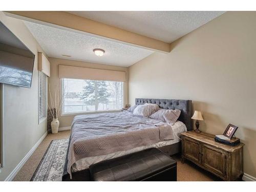 20 Panatella Manor Nw, Calgary, AB - Indoor Photo Showing Bedroom