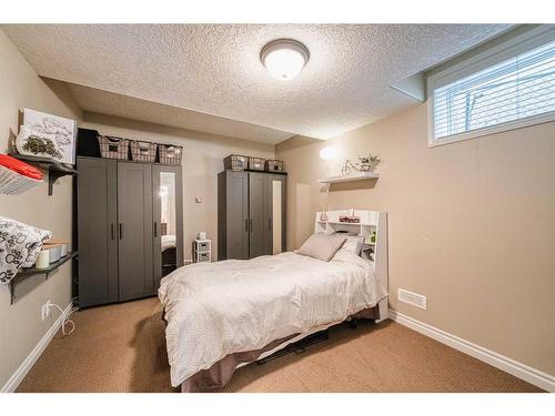20 Panatella Manor Nw, Calgary, AB - Indoor Photo Showing Bedroom