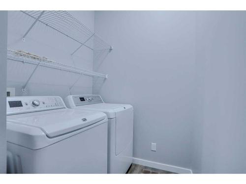 98 Evansbrooke Park Nw, Calgary, AB - Indoor Photo Showing Laundry Room