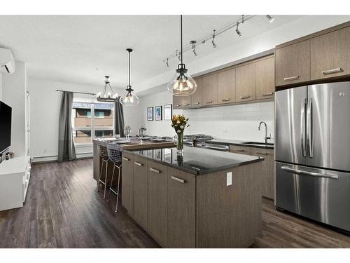 306-811 5 Street Ne, Calgary, AB - Indoor Photo Showing Kitchen With Stainless Steel Kitchen With Upgraded Kitchen