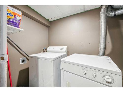 46 Templeby Way Ne, Calgary, AB - Indoor Photo Showing Laundry Room