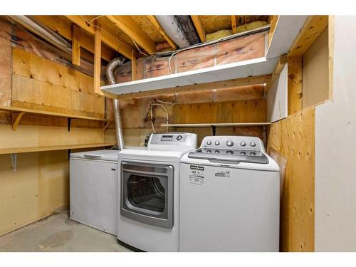 139 Appleglen Park Se, Calgary, AB - Indoor Photo Showing Laundry Room