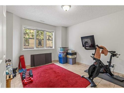 5-125 Rundle Crescent, Canmore, AB - Indoor Photo Showing Gym Room
