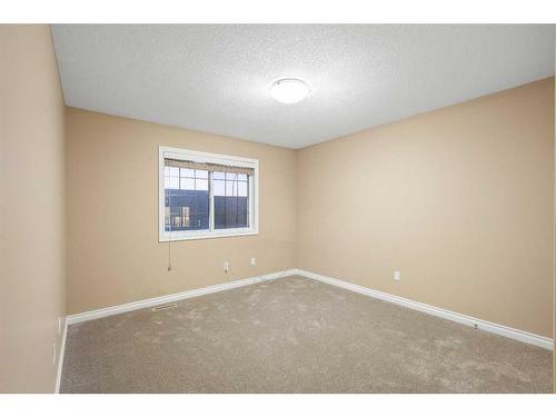 23 Taracove Estate Drive Ne, Calgary, AB - Indoor Photo Showing Other Room