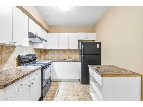 23 Taracove Estate Drive Ne, Calgary, AB - Indoor Photo Showing Kitchen