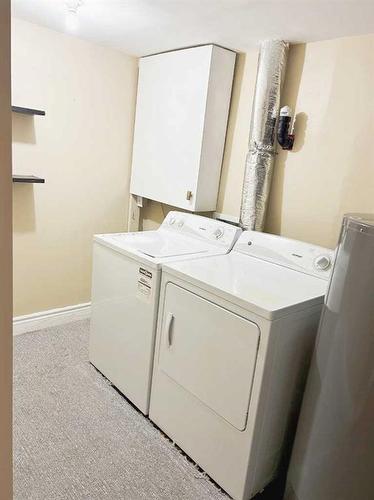 95 Kincora Drive Nw, Calgary, AB - Indoor Photo Showing Laundry Room