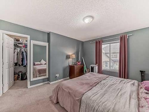 127 Hidden Creek Rise Nw, Calgary, AB - Indoor Photo Showing Bedroom