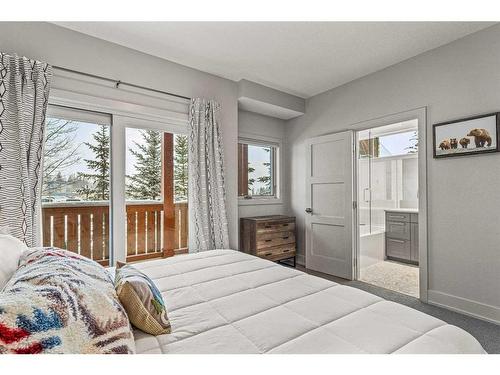 604-3000J Stewart Creek Drive, Canmore, AB - Indoor Photo Showing Bedroom