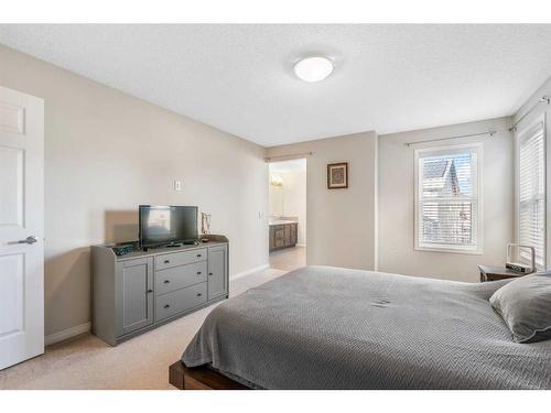 14 Walden Grove Se, Calgary, AB - Indoor Photo Showing Bedroom