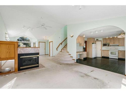 28 Arbour Glen Green Nw, Calgary, AB - Indoor With Fireplace