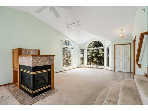 28 Arbour Glen Green Nw, Calgary, AB - Indoor With Fireplace