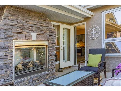 148 Christie Park View Sw, Calgary, AB - Outdoor With Fireplace With Exterior
