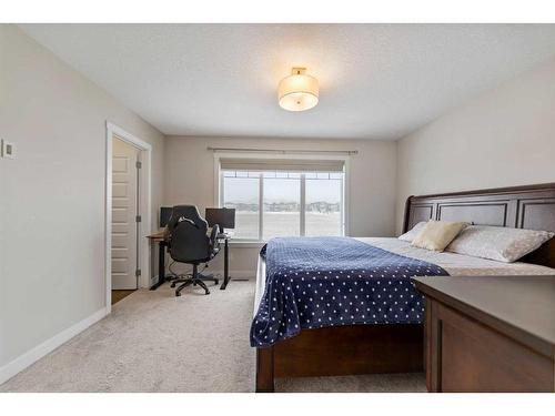 344 Bayview Street Sw, Airdrie, AB - Indoor Photo Showing Bedroom