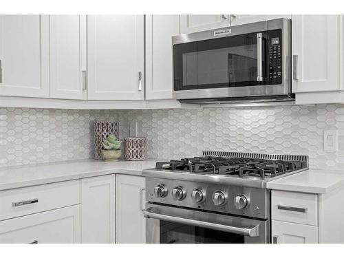 14932 Parkland Boulevard Se, Calgary, AB - Indoor Photo Showing Kitchen With Upgraded Kitchen
