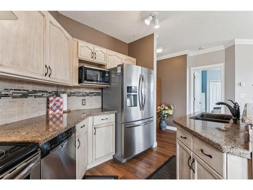 113-78 Prestwick Gardens Se, Calgary, AB - Indoor Photo Showing Kitchen With Stainless Steel Kitchen With Double Sink