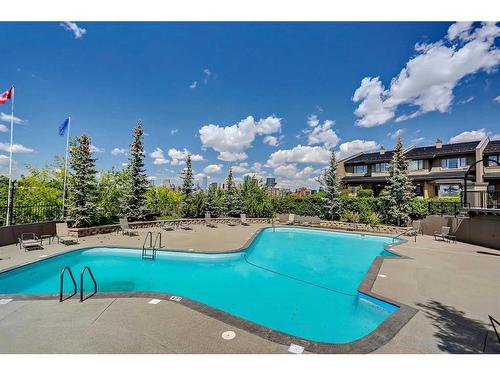 15-3203 Rideau Place Sw, Calgary, AB - Outdoor With In Ground Pool With Backyard