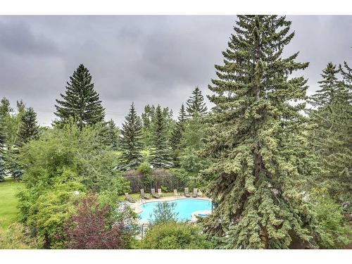 15-3203 Rideau Place Sw, Calgary, AB - Outdoor With In Ground Pool With View