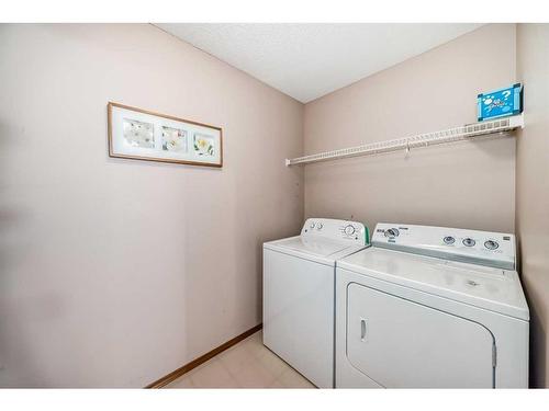 240 Arbour Ridge Way Nw, Calgary, AB - Indoor Photo Showing Laundry Room