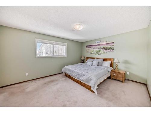 240 Arbour Ridge Way Nw, Calgary, AB - Indoor Photo Showing Bedroom