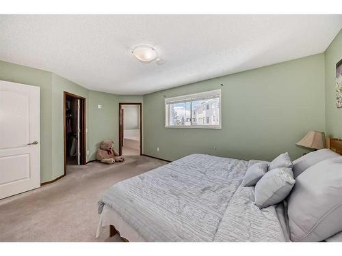 240 Arbour Ridge Way Nw, Calgary, AB - Indoor Photo Showing Bedroom