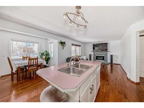 240 Arbour Ridge Way Nw, Calgary, AB - Indoor With Fireplace