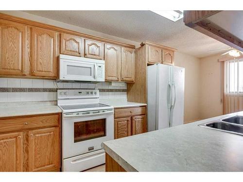 1-6314 58 Avenue, Red Deer, AB - Indoor Photo Showing Kitchen With Double Sink