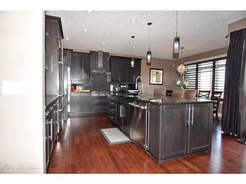 253 Tuscany Estates Rise Nw, Calgary, AB - Indoor Photo Showing Kitchen With Stainless Steel Kitchen With Upgraded Kitchen