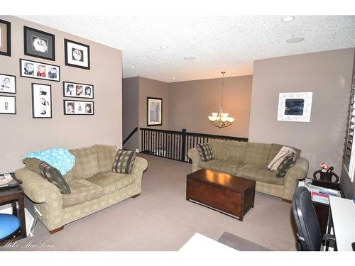 253 Tuscany Estates Rise Nw, Calgary, AB - Indoor Photo Showing Living Room
